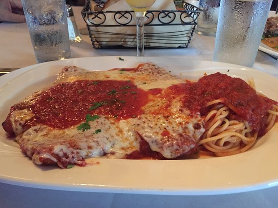 Enzo’s of Arthur Avenue signature dishes Prosciutto Wrapped MozzarellaPappardelle with Veal RaguGrilled Pork Chops with Vinegar PeppersPan-Seared Sea Scallops